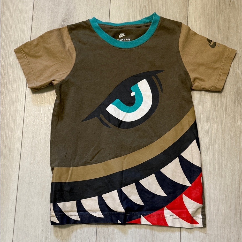 Nike Kid’s Olive & Tan Dinasaur Bite Graphic Tee size Small